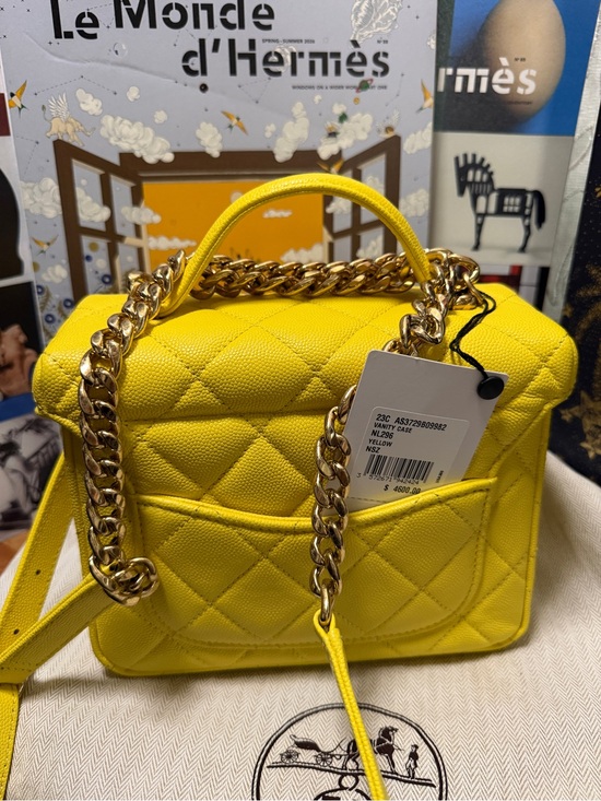 CHANEL Handbags - CHANEL Yellow Quilted Mini Top-Handle Bag with Gold Chain